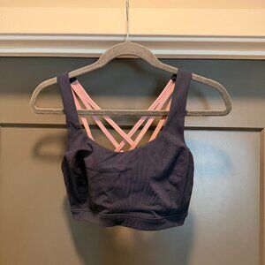 Navy and pink free to be serene sports bra